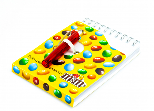 M&M, writing pad, notepad, ring binding and mini ballpoint pen (extendable)