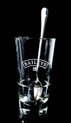 Baileys liqueur, latte macchiato glass liqueur glass in relief with stainless steel spoon